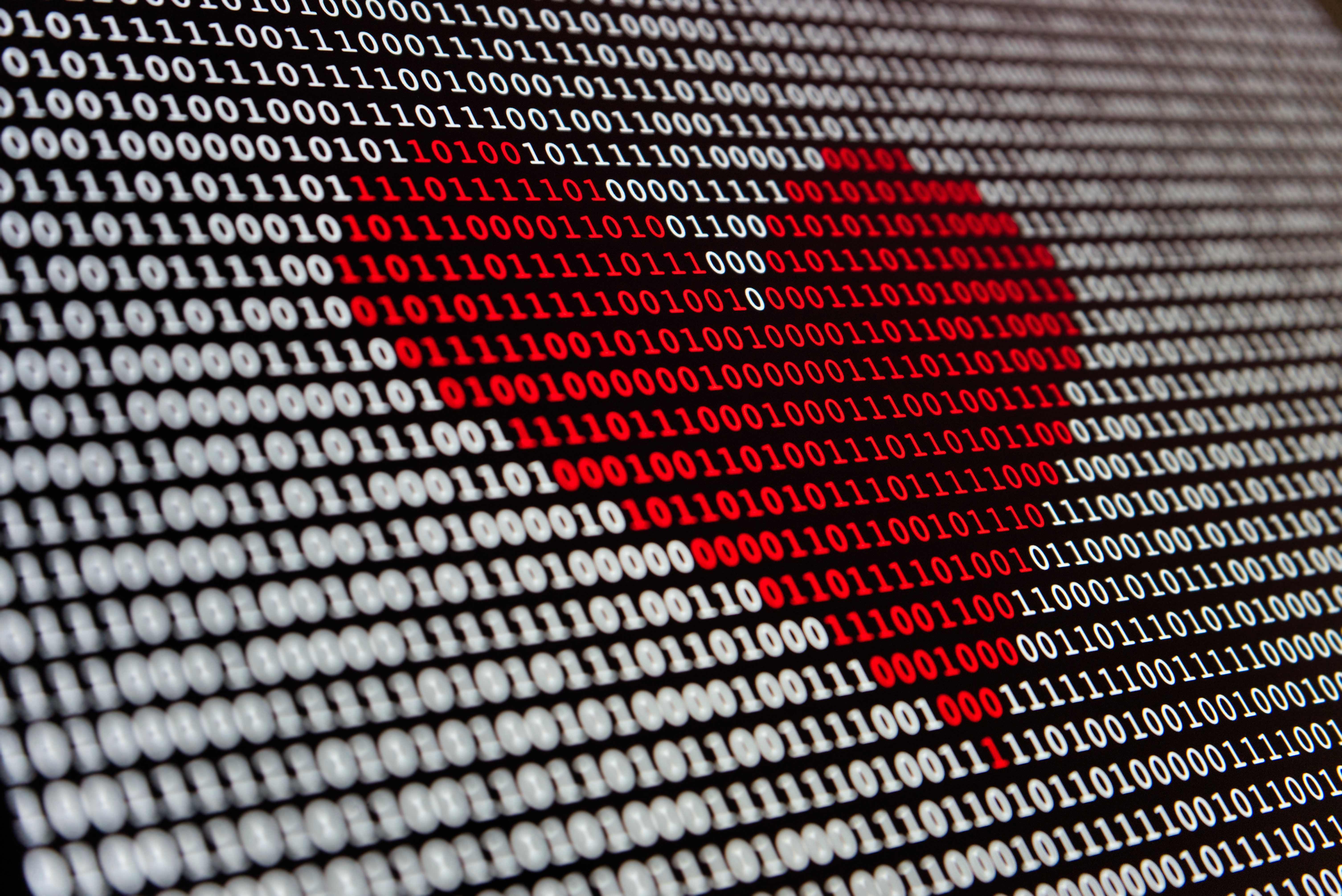 Photo by Alexander Sinn/unsplash 'Red heart made out of binary digits'